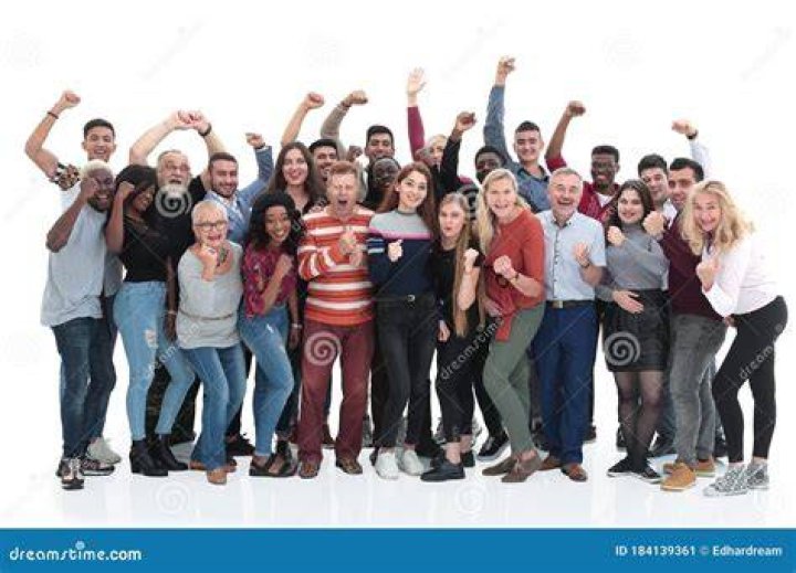a group of people standing next to each other