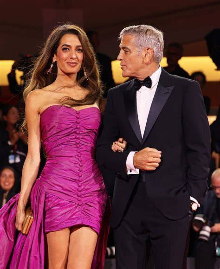 Amal Clooney Stuns in Pink Feather Minidress for Date Night With