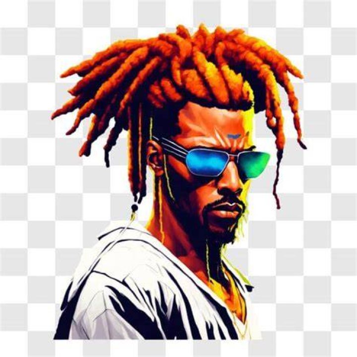 Download A Man With Dreadlocks Standing In Front Of A River