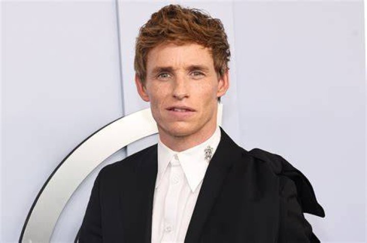 Eddie Redmayne's pregnant wife Hannah touches her baby bump in LA