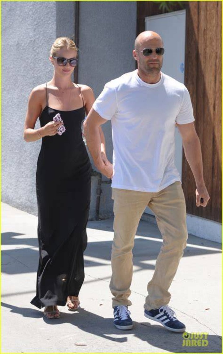 Jason Statham holds hands with son Jack, 2, during casual stroll in LA