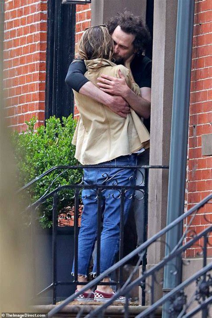 Keri Russell affectionately kisses Matthew Rhys before heading out