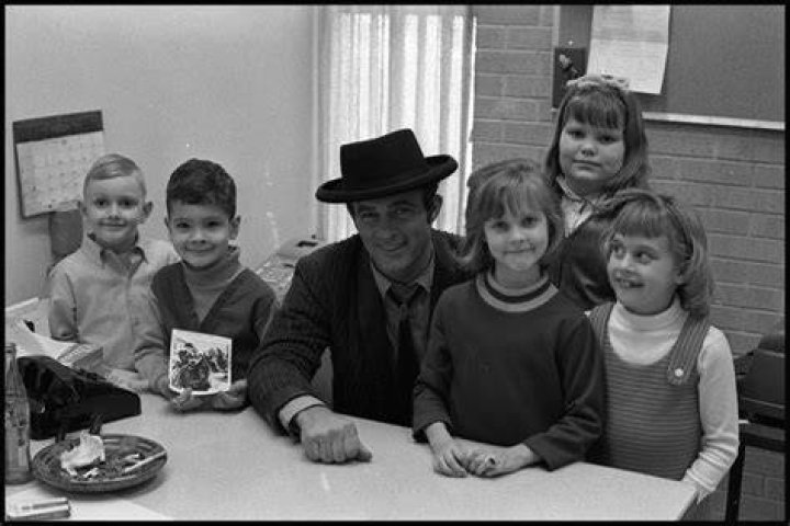 [Robert Conrad Sitting With Children Surrounding Him] The Portal to