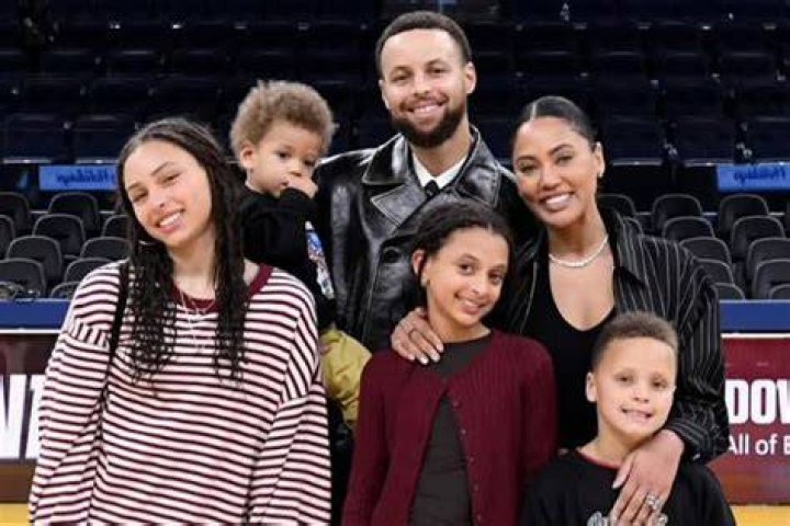 Steph Curry and family pose with championship trophy in adorable photos